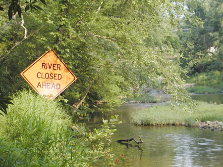 River closed ahead Sign